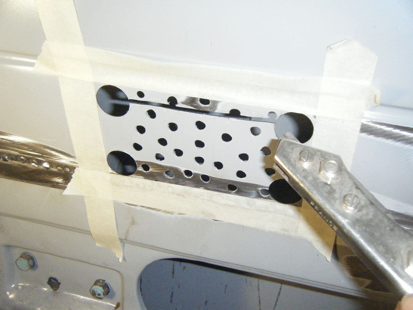 How to cut a hole in sheet metal. Tip of the day 123013 Hot Rod